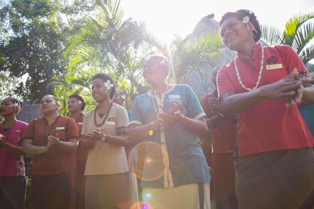 Outrigger Fiji Beach Resort Korotogo Exterior foto A group of people dancing in the Solomon Islands
