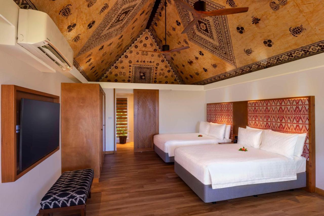 Outrigger Fiji Beach Resort Korotogo Exterior foto A bedroom at the Sheraton Resort Fiji